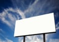 Brand new billboard and a wispy blue sky